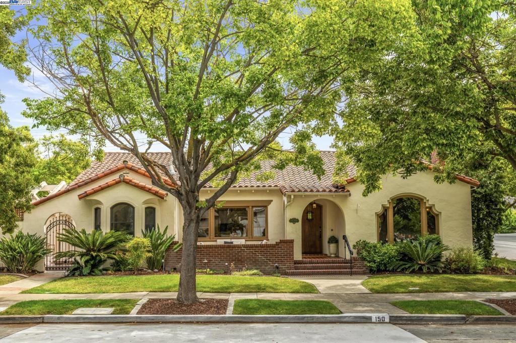 Welcome to this beautifully preserved Spanish Revival home where timeless architecture blends seamlessly with modern comfort. Built in 1937 and thoughtfully remodeled throughout the years to maintain its period character, this home offers over 2,600 sq. ft. of living space, including a finished basement that doubles as a guest retreat. Classic details like hardwood and terrazzo floors, arched doorways, and rich mahogany trim are seamlessly paired with a chef’s kitchen, custom cabinetry, and modern upgrades including built-in surround sound, a three-zone HVAC, tankless water heater, whole-home water softener, thermopane windows, and programmable thermostats. The lower level includes a spacious wine cellar and guest suite with full bath, while the garage features a mini-split AC, epoxy flooring, custom cabinetry, and natural-light panels—ideal for hobbies or a workshop. Outdoor living shines with a large courtyard, built-in BBQ, overhead lighting and fans, plus a second backyard patio with new storage shed. Just minutes from downtown San Jose, freeway access, light rail, and the Guadalupe River Trail, this home blends history, innovation, and neighborhood charm.
