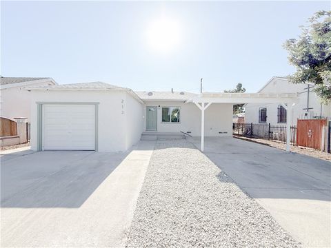 Photo of 213 N Broadacres Avenue, Compton, CA 90220 (MLS # IG26161133)