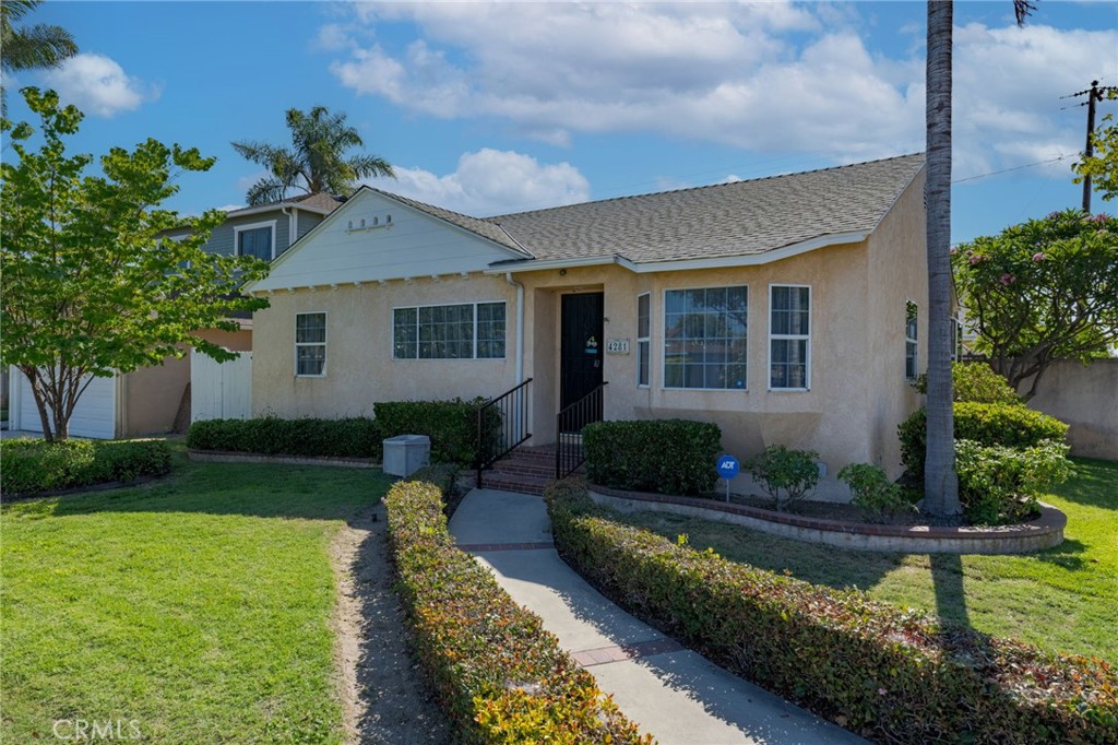 Welcome to this beautifully maintained home located in the heart of Lakewood’s desirable Carson Park neighborhood. Situated on a spacious corner lot, this freshly painted home offers timeless appeal with its original hardwood floors and modern touches like recessed lighting in the kitchen. The roof is approximately 6 years old, providing added peace of mind. Enjoy an abundance of natural light, a functional layout, and a backyard featuring mature tropical plumeria trees, two lemon, two tangerine and an orange tree —perfect for relaxing or entertaining. Two car detached garage has convenient storage cabinets and loft storage as well. This property combines location, charm, and potential in one of Lakewood’s most beloved communities. Don’t miss your chance to call this special home yours!
