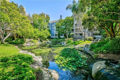 Photo of 20301 Bluffside Circle #D401, Huntington Beach, CA 92646 (MLS # SB25184198)
