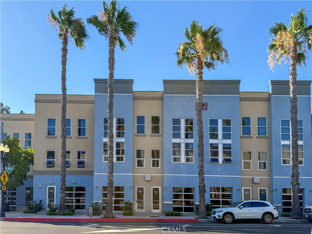 HONEY STOP THE CAR! THIS IS IT! Discover a truly unique urban gem in the vibrant heart of Santa Ana's Lacy neighborhood. The ultimate live/ work space! Situated just steps from downtown's bustling dining, shopping, and transit hub, this spacious 1-bed, 1.5-bath condo offers 1,583 sq ft across three levels of modern, light-filled living space. Open-layout loft design with high ceilings and soaring windows that flood the interiors with natural light.
Thoughtfully designed with stacked staircases, a lofted bedroom, and half-bath downstairs-perfect for a home office or client-ready workspace.
Quality finishes throughout: hardwood, concrete, and carpet flooring, contemporary lighting, and open chef-style kitchen with built-in appliances.
In-unit laundry, BRAND NEW HVAC system! Tandem 2-car garage with direct access provides secure parking and storage options. Located in the Lacy district, this condo places you within walking distance of local favorites like The Roost, Benchmark, and upcoming OC Streetcar transit stations. Extremely low interest rate, assumable VA loan for any eligible veteran! This one won't last!