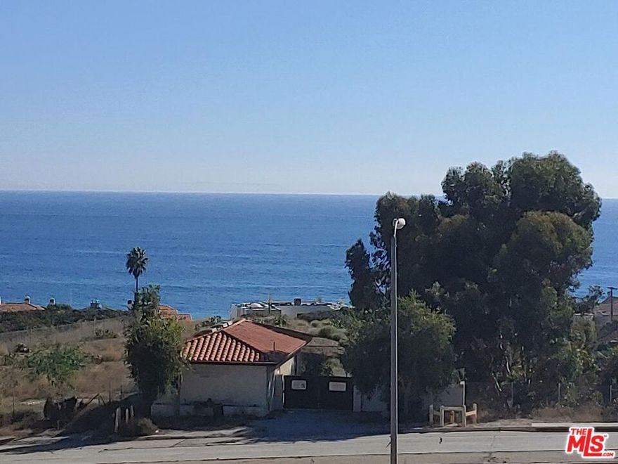 Available Now! Partially FURNISHED or Unfurnished, enjoy incredible ocean views from this lovely, updated townhome. Experience a luxurious lifestyle in Central Malibu, walking distance to Pepperdine, shopping at the new Whole Foods, Lumber Yard, Farmer's Market, Malibu Country Mart, take a stroll on Malibu Pier, World class surfing, dog park and the beach! Open floor plan, lots of natural light, great indoor / outdoor living, large living room with fireplace, chef's granite kitchen, professional appliances, breakfast nook, big ocean view deck and large ground patio yard with ocean views! Large primary suite has walk-in closet and marble master bath. Both primary suite and guest bedroom are on the bottom floor, with ocean views, and have a covered, large patio yard. Move-in ready, newer bamboo & wood floors throughout! Light and airy floor plan. Private laundry inside unit. Community amenities include Olympic size heated pool, spa, two saunas, changing rooms, BBQ, and more. Covered parking with storage. Amenities include salt water Olympic size pool, large jacuzzi, two separate saunas, showers and changing rooms. Close to Pepperdine University, Location! Location! - Nothing else compares at this price! Grab it quick before it's gone! If you're looking for a retreat with modern conveniences and an unbeatable location with panoramic views of the ocean, welcome home!