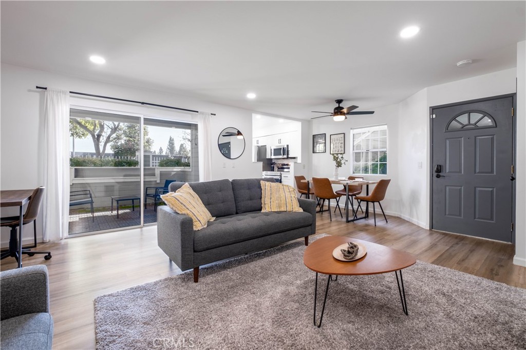 Breeze into this beautifully and recently remodeled ground-floor one-bedroom condo, perfectly situated in the desirable gated community of Chelsea Court. Every detail has been thoughtfully updated to combine modern elegance with everyday comfort. The open and airy floorplan is enhanced by recessed lighting, luxury vinyl plank flooring, and abundant natural light. The newly designed custom kitchen is a true centerpiece, featuring sleek shaker cabinets, quartz countertops, a custom tile backsplash, and stainless-steel appliances—including a range, microwave hood, and dishwasher. The single-basin undermount sink with pull-down faucet adds both style and function. Retreat to your spacious bedroom with a generous walk-in closet, while the remodeled bathroom showcases timeless tile flooring, a shaker vanity with quartz counters, and chic matte black finishes. Convenience is key with an in-unit laundry closet, central heating and air conditioning, and an attached garage. Step outside to enjoy your private patio—ideal for relaxing or entertaining. Chelsea Court offers resort-style amenities including a sparkling pool, two relaxing spas, fitness center, and a BBQ area. Located in the heart of South Coast Metro, this condo is in one of Orange County’s most vibrant neighborhoods. It places you at the epicenter of premier shopping, dining, and entertainment. Indulge in world-class experiences at nearby South Coast Plaza, catch captivating performances at the Segerstrom Center for the Arts, and immerse yourself in the culture at the Tony Award-winning South Coast Repertory. With convenient access to major freeways, including the 405, 55, 73, and 5, the best of Orange County is at your fingertips—from the magic of Disneyland to the sun-kissed shores of its iconic beaches. Don’t miss your chance to own this move-in ready condo blending comfort, style, and convenience in one of Orange County’s most sought-after locations.