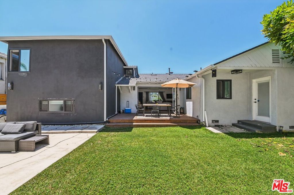 This one of a kind property has it all! A generous lay out, almost 2,000 sq ft, 4 bedrooms, open floor plan, abundant natural light. It truly embodies California living with its effortless indoor and outdoor flow, featuring an uncommon bi-fold door that opens to the backyard deck and a grass area perfect for entertaining and relaxation. In the most desirable location - ten minutes away from the SoFi Stadium, soon to host the FIFA World Cup and the Olympics. While the whole house went through a major remodeling in 2021, the seller replaced the roof in 2022, installed gutters and a tankless water heater. The spacious kitchen is equipped with newer stainless steel appliances, an island with breakfast bar and the washer and dryer are conveniently tucked away. Exceptional features include direct access to a two-car garage, double pane windows and much more. As a real estate agent with more than 30 years experience in the field, I'd be remiss if I did not offer a bit of extra information on this property and the city it's in. Inglewood, is one of the most up and coming cities in Southern California. Boasting the two newest stadiums in the country. You can feel the progressive, innovative flow of the city - the SoFi playfully offered itself to host Taylor's wedding :-). It's of course a must for every great artist to make a stop in their tour; and the job market is thriving. This lovely home wants to belong to you!!! Come and check out how wonderful it feels to be here.