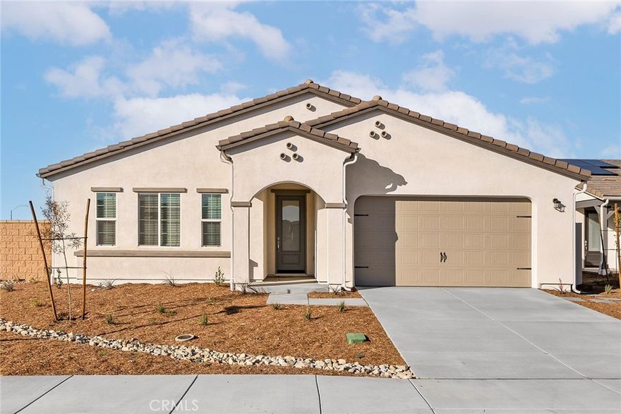 The Tortolita floor plan presents an elegantly designed single-story home that excels in both comfort and functionality. Boasting five generously sized bedrooms, this layout includes a master suite with a dual sink vanity, a step-in shower, and a separate private toilet room for added privacy. One of the additional bedrooms features its own full bathroom, providing a private retreat for guests or family members. The open-concept design of the home seamlessly integrates the kitchen, family room, and dining area, creating an inviting space for both everyday living and entertaining. The kitchen stands out with modern stainless-steel appliances, stylish plank flooring, and a convenient walk-in pantry. A covered porch and patio extend the living space outdoors, perfect for relaxation and social gatherings. A well-appointed mud room enhances the home’s practicality, offering a designated area for managing everyday items and keeping the home organized. Additionally, a dedicated laundry room adds to the overall efficiency and convenience of this thoughtfully designed residence.