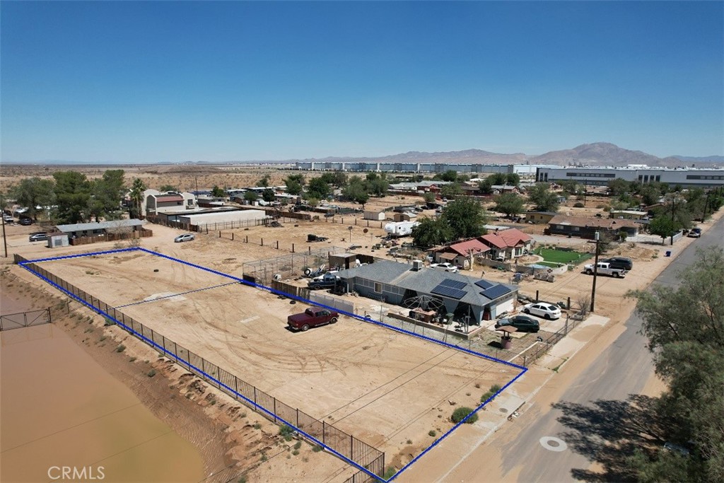 Look no further, this lot and the one next to it totaling 17,640sf, or .4050 Acres. (APN 0459-161-66-0000 & 0459-161-63-0000) each lot consist of 8,820sf, and are separately available for sale, located in an Opportunity Zone, buy and develop now, or hold for appreciation, Nice flat, buildable lots on a paved road, conveniently located near the US-395 Hwy in Adelanto and just up the street from the Southern California Logistical Airport, near, Adelanto City Hall, Sheriff's dept., gas stations, convenient stores, please refer to the Zoning Matrix and the City of Adelanto's zoning map to find out more on what types of use this area allows all utilities adjacent to lot. Google Map Coordinates:(34.584867, -117.404597) Yellow and blue lines demarcating boundaries are approximate, not surveyed, buyer and buyers agent to verify utilities, zoning & exact boundary lines.