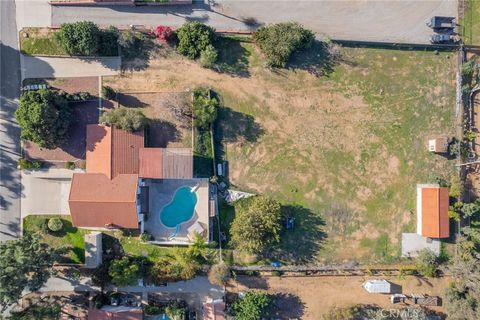Photo of 15750 Pounders Drive, Riverside, CA 92504 (MLS # IV25276977)