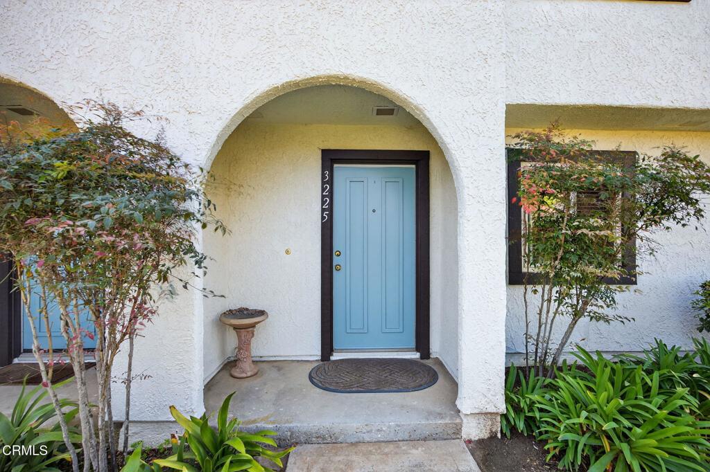 Welcome to the Mandalay Beach Townhomes Community, ideally located between Malibu and Santa Barbara. This move-in-ready 2 bedroom, 2 bath home features modern updates throughout, including a fully remodeled kitchen with new appliances and two beautifully renovated bathrooms. The open floor plan flows from the kitchen into the living room, where you'll find a cozy gas fireplace and access to a private, fenced patio with a deck--perfect for relaxing or entertaining. Custom mural on kitchen breakfast bar wall done by Lisa Kelly. Additional highlights include in-unit laundry, ample closet space, and a finished 2-car garage with drywall. The resort-style community offers a swimming pool, tennis courts, RV parking, lush green landscaping, and plenty of guest parking near the unit. The exterior has also been recently updated with fresh paint and a brand-new roof, offering peace of mind and great curb appeal. Just minutes from Seabridge Marina and Channel Islands Harbor--enjoy easy access to local dining, shopping, a weekly farmers market, and the beach!