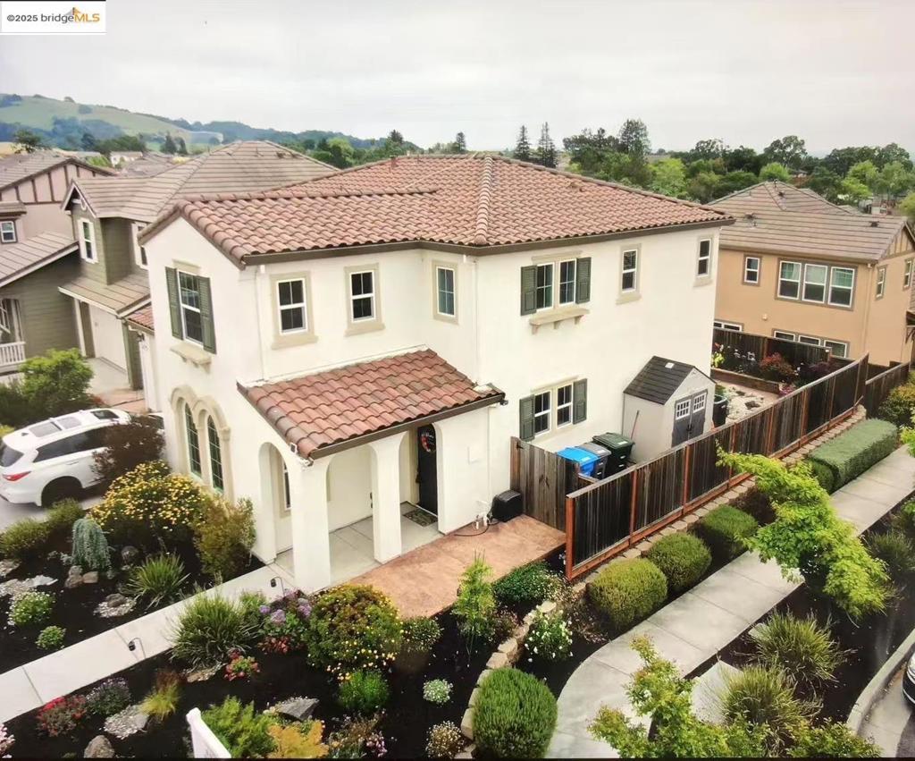 Discover this meticulously maintained 4-bedroom, 3-bathroom contemporary residence, built by Meritage Homes in 2014 and situated in the highly desirable Ragle Ranch neighborhood. Thoughtfully designed for modern living, this home seamlessly blends energy efficiency, superior craftsmanship, and a versatile layout. At the heart of the home, the gourmet kitchen boasts rich dark wood cabinetry, a spacious center island, elegant granite countertops, and a premium stainless steel appliance package—an ideal space for both daily living and entertaining. The main level features a generous den, which can serve as an optional bedroom, alongside a full bathroom—perfect for guests, a home office, or multi-generational living. Upstairs, a spacious bonus loft area provides additional flexibility, complementing two well-sized bedrooms connected by a convenient Jack-and-Jill bathroom. A dedicated laundry room with included washer and dryer is located on the upper level for added convenience. The luxurious primary suite offers a serene retreat, complete with dual walk-in closets and a spa-like en suite bathroom. Enhancing its appeal, the home benefits from a leased solar system for improved energy efficiency. Ideally positioned just steps from a community park featuring a basketball court & park.