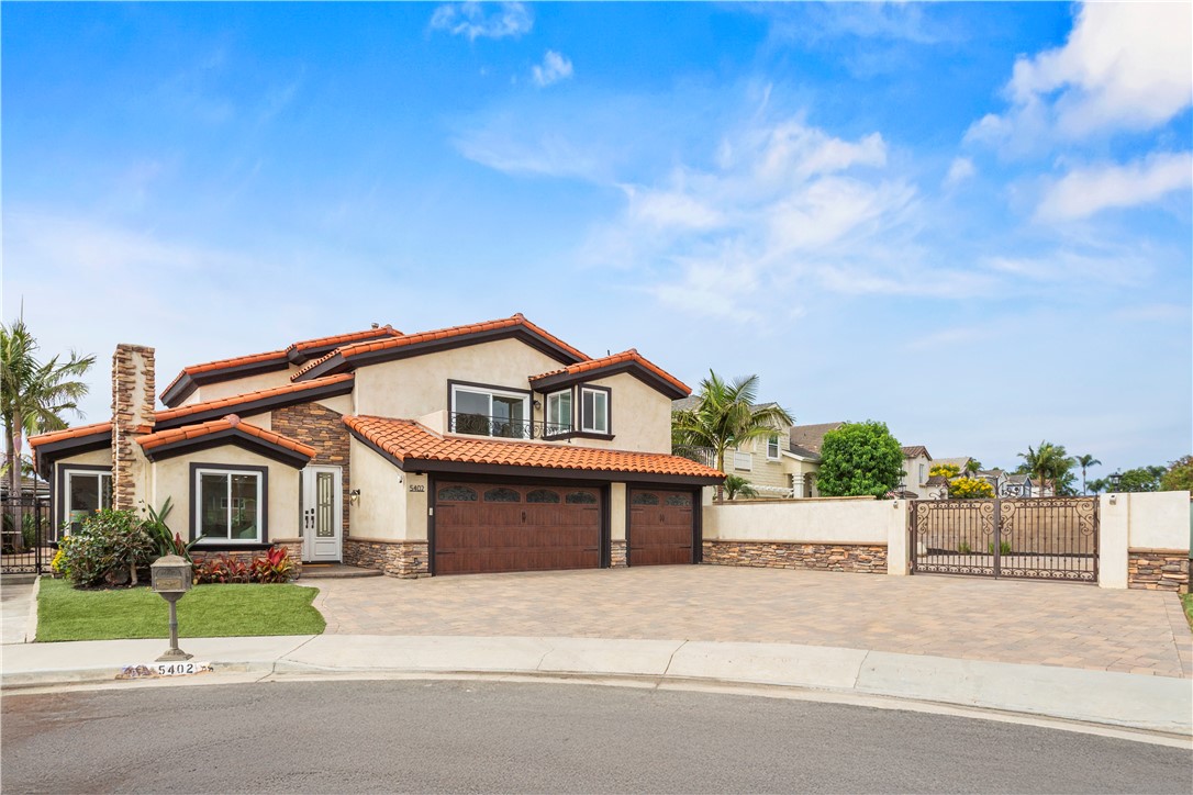 We're sure you've heard "this home checks all the boxes." Of course you have! BUT REALLY...this home CHECKS ALL THE BOXES! Discover the perfect blend of indoor and outdoor coastal living in this BIG FAMILY HOME with 5 BEDROOMS and 4.5 BATHS, including 3 PRIVATE ENSUITES for ultimate flexibility and comfort. Set at the END OF A QUIET CUL-DE-SAC on an OVERSIZED 8,000+ SQFT LOT, this 3,000 sqft home offers amazing features for multi-generational living, entertaining, and enjoying the Southern California lifestyle.
Start your mornings or end your evenings on the OCEAN VIEW ROOFTOP TERRACE, where coastal breezes and sunset views create the perfect place to unwind. The double-door entry foyer welcomes you to LIGHT-FILLED SPACES and generous living areas that flow seamlessly for family time or larger gatherings. Quiet relaxation spots can also be found, including a cozy fireplace nook and sunny breakfast bay.
You’ll love the DOWNSTAIRS PRIMARY BEDROOM, offering privacy and easy access, perfect for guests or long-term living. All of the bedrooms are HUGE and can accommodate king-size beds or offer plenty of "kid" space for sleep, study, and play. Each ensuite bedroom offers OUTDOOR ACCESS: The two upstairs have private balconies, and the downstairs suite opens through a sliding door to the patio.
Throughout the home, you'll find HARD SURFACE FLOORING throughout for a clean and contemporary look. Energy-efficient DUAL PANE WINDOWS AND SLIDERS keep the home comfortable and bright. And yes, there’s CENTRAL AC to keep things cool all summer long.
The ENTERTAINER’S REAR YARD is your private resort, featuring a LARGE POOL with waterfall feature, SUNNY PATIO AREA, and ample space for summer parties or lazy weekends. The property shines with beautifully finished PAVERS lining the driveway, RV gate access, and backyard, adding a polished touch to every corner.
Need room for your toys? How about an oversized 3-car garage with EV CHARGING and GATED RV ACCESS that provides secure parking for your RV, boat, or extra vehicles.
This location CANNOT be beat...just minutes to SUNSET BEACH and steps to MEADOWLARK GOLF CLUB. Bolsa Chica Wetlands, Butterfly Park, restaurants, and shopping are also close by. EZ access to freeways too! This beautiful home offers the BEST VALUE in all of HB and Coastal OC!