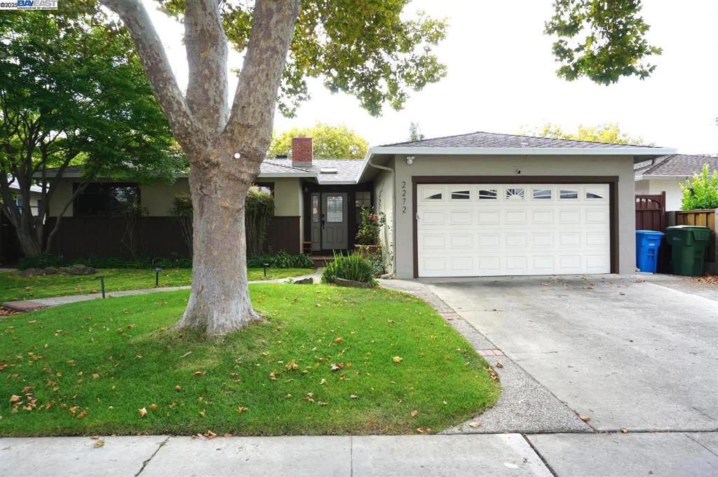 Welcome home! Absolutely move-in ready for your family! In the heart of the home is the sunny, beautiful family room with vaulted ceilings, 2 skylights, fireplace & a large bay window which opens to the lush green backyard. The formal dining area connects to the open living room with its own fireplace. The updated kitchen features granite countertops, breakfast bar, gas stove, stainless steel appliances and skylight. The outdoor kitchen with travertine countertop bar, stainless steel 36-inch BBQ gas grill/stove, mini-fridge, sink makes entertaining families and friends so much fun! New SPC floor throughout the house. Another skylight in the newer hallway bathroom! New master shower adds elegance and comfort. 5 years old Landmark Pro roof & newer Samsung AC. The upgrade is endless! Close to shopping centers/restaurants & big tech companies such as Apple, NVIDIA (only 5 mins drive) and parks. Don't miss this opportunity to make this Silicon Valley home yours! Open house Saturday & Sun 1:00PM-4:00PM.
