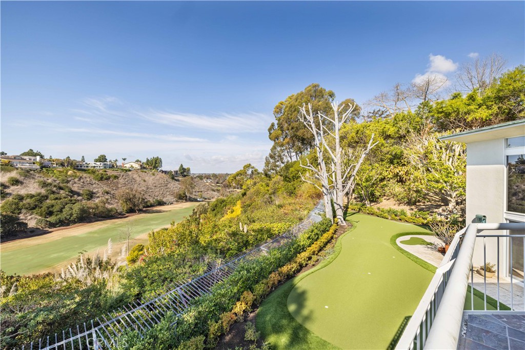 Located behind the gates of Big Canyon Country Club, this modern mid-century home sits on a private cul-de-sac lot with expansive golf course and canyon views. The property features bold architectural lines and a multi-level floor plan that reflects its era, offering a unique opportunity for buyers to reimagine or rebuild in one of Newport Beach’s most coveted communities.