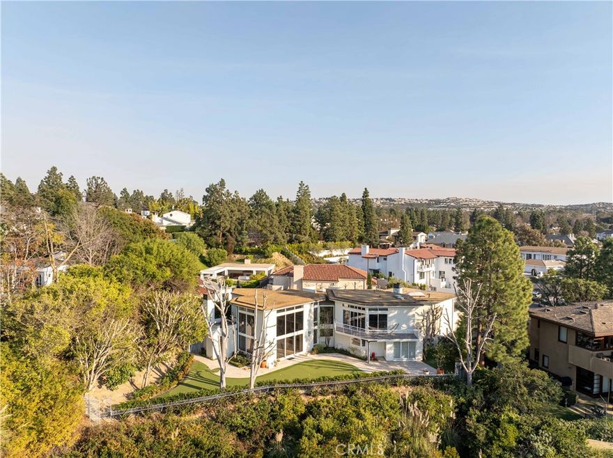 Located behind the gates of Big Canyon Country Club, this modern mid-century home sits on a private cul-de-sac lot with expansive golf course and canyon views. The property features bold architectural lines and a multi-level floor plan that reflects its era, offering a unique opportunity for buyers to reimagine or rebuild in one of Newport Beach’s most coveted communities.