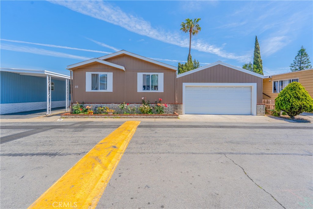 Welcome to your next home in the heart of Anaheim, Orange County! This beautifully maintained 4-bedroom, 2-bathroom mobile home offers comfortable living with space for the whole family. Located in a friendly, well-kept community, you'll enjoy access to great amenities including a sparkling community pool, perfect for relaxing or entertaining on sunny SoCal days.