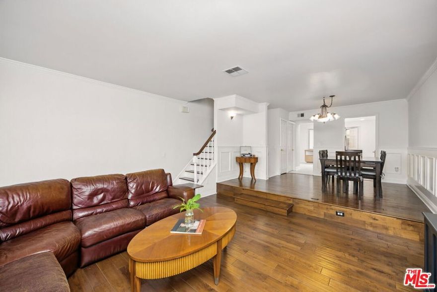 Welcome to one of the largest tri-level townhomes in the heart of Chatsworth, offering 1,896 sq ft of thoughtfully designed living space. This spacious unit features 4 bedrooms and 3.5 bathrooms, including three bedrooms upstairs for optimal separation of living and sleeping areas.The bright living room features a cozy fireplace, while the formal dining area is filled with natural light ideal for everyday living and entertaining. Enjoy the private balcony overlooking a quiet, tree-lined street, along with recessed lighting throughout. The lower level offers a fourth bedroom and a convenient half bath perfect for guests, a home office, or flex space. Additional highlights include a private 3-car attached garage, in-unit laundry, and access to a well-maintained community with a pool and spa. Located just moments from local schools, grocery stores, and with easy access to the 118 Freeway, this home blends space, comfort, and convenience in one of Chatsworth's most desirable neighborhoods.