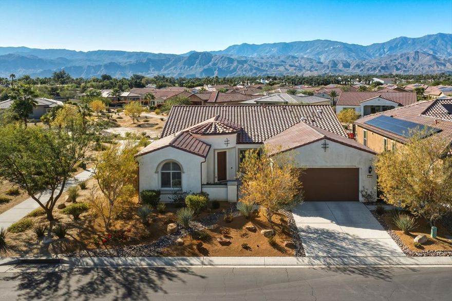 Impeccably Upgraded Desert Retreat -- Modern, Versatile & Move-In Ready PREMIUM lot with open space and extraordinary views!  Step inside your Serenity Model 2BD/2BA home, complimented with TWO additional versatile, multi-purpose rooms. Perfect for a home office, tranquil retreat, or extra bedrooms.Enhanced with 17 owned solar panels and an extended garage with two EV 220 stations, Rinnai tankless water heater and eight central vac locations, and surround sound. Experience this home in person to fully appreciate every extensive upgrades throughout!  Meticulously installed Italian tile flooring flows throughout the home and across all four patios, creating a seamless indoor-outdoor living experience enhanced by three distinct sliding doors.  Plantation shutters, bay windows in dining room and primary bedroom-enhancing tray ceilings above.  Primary bedroom features glass walk-in shower, and a spacious walk-in closet with skylight.  Gourmet kitchen - Kitchen Aide appliances, custom cabinets, center island with cabinets, walk-in pantry. Look no further within this premier 55+ community that offers - Fitness Center, Clubhouse, pools, tennis/pickle ball courts, walking trails, social activities. Fabulous and convenient location within Rancho Mirage. Cheers to 2026 and exciting new life chapters!                 Stay - Play - Invest!
