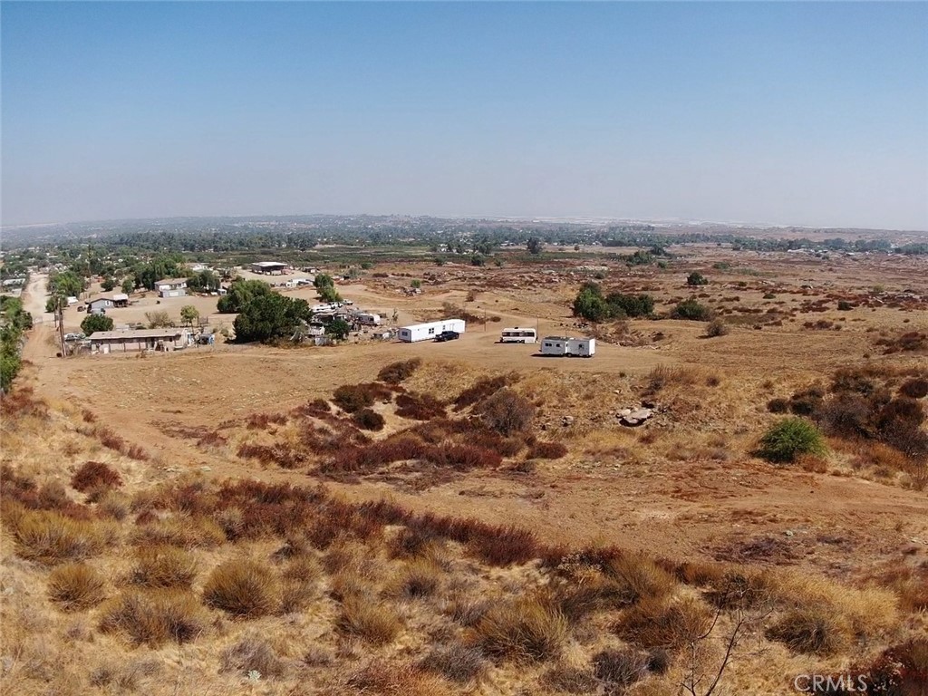 Great investment opportunity.! 5.05 acres next to big Custom home, many possibilities.! There is an Electrical pole close to the property, Buyer is advise to investigate the proximity of Utilities.
