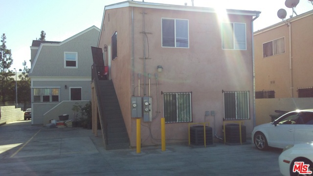 This is 3 unit apartments with 2 brand new unit and absolutely no rent control. 2 brand new apartment are permitted at this year. All 3 units has central air condition and heating. Single house at front has remodeled 1 year ago. all units has wash and dry hook up.Buyer must check all city requirements and permits including square feet, highway dedication with LA city of building & safety.