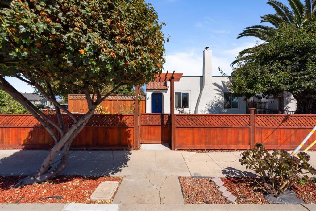 "Charming Spanish-style 2-bedroom home in South Salinas. Nestled on a desirable corner lot, this beautifully presented residence is in move-in condition with a host of upgrades. Recent improvements include a new roof, new windows, a walk-in closet off the main bedroom, new interior and exterior doors, a newly fenced front and backyard, a sprinkler system, additional electricity and water to the garage, and an upgraded electric panel in 2020. The home features warm hardwood floors, an inviting fireplace in the living room, and multiple windows that fill the space with light. The kitchen is a chef's delight, featuring stainless steel appliances, butcher block counters, and a designer backsplash. Outside, a private courtyard provides an ideal spot for gatherings with family and friends. The lush yard is planted with a variety of fruit trees, such as avocado, nectarine, lemon, orange, fig, and more, creating a little oasis. Conveniently located near parks, schools, downtown, the local hospital, and great shopping, this home truly has it all.