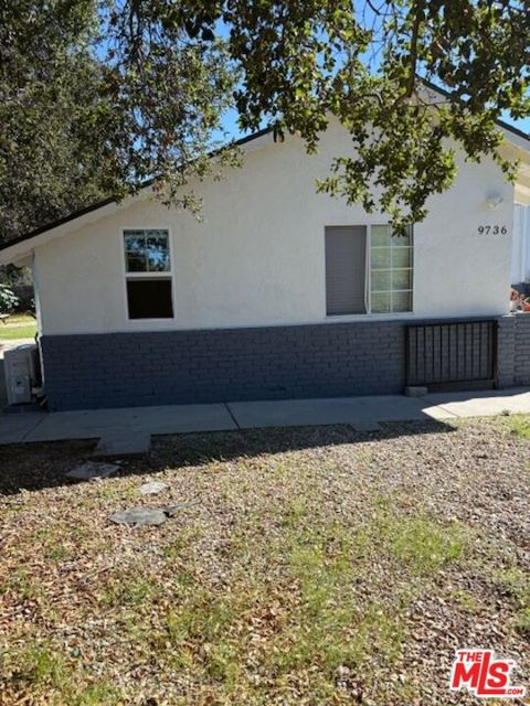 Photo of 9736 Tujunga Canyon Place, Tujunga, CA 91042 (MLS # 25616577)