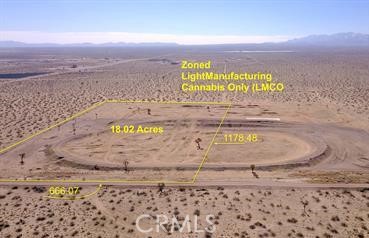 INDUSTRIAL LAND FOR SALE totaling 34.79 acres on one of Adelanto's major streets. Defunct Adelanto Dirt Race Track - previously the property had a 3/8 mile clay oval track in front, with a Motocross Race Track in rear. Plenty of parking for race days. Easy to convert back for industrial uses. Now located in Adelanto's Heavy Manufacturing Industrial Zone (MI zone). Zoning allows Heavy Manufacturing, Heavy Industrial and even Cannabis Uses. Check with the City of Adelanto for possible uses. Seller will provide financing with as little as 15% down. AND, Seller is even willing to consider auto-related items as part of the down payment and/or joint venture! Be Creative! City is very friendly towards developers. Lot features 1295 feet of frontage on Rancho Road. But, it is located about 1.0 miles west of Koala Rd where pavement and utilities end. Some buildings are in the planning stages between Koala and our location, and should be breaking ground soon. Again, Submit all of your Creative Offers...all offers will be considered. Seller's health forces sale.