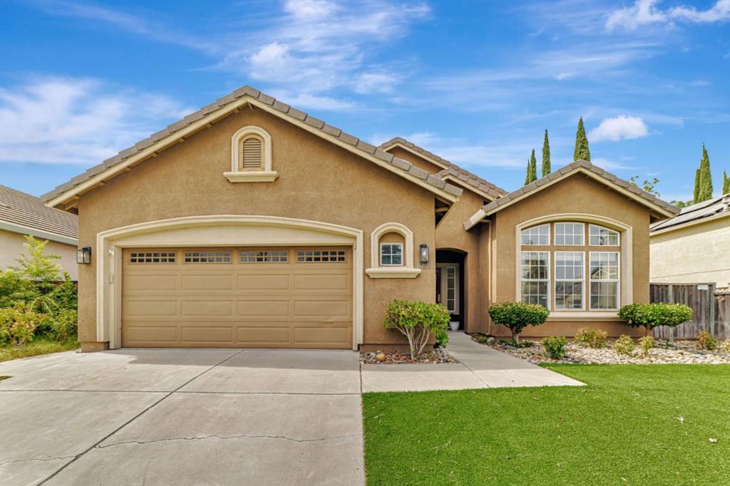 This charming 3-4-bedroom one-story home is ideal for your growing family. It is located within walking distance to a playground, sits on a quiet, tree-lined street and has no backyard neighbors. The open floor plan, big windows and high ceilings make it perfect for entertaining. The kitchen is the heart of this home! Featuring a beautiful 8ft window, richly crafted cabinetry, 2 pantries, breakfast bar and lots of cabinet space. You're only a few steps away from the family room where you can gather around the fireplace & relax. Spacious primary suite with a bonus room which could be used as an exercise room or nursery and can be converted back into a 4th bedroom.. It features spa-like bathroom with garden tub, double sinks & ample storage. You'll also find custom California closets in several rooms. Exterior features a low maintenance landscaping all throughout & an inviting patio perfect for summer parties!