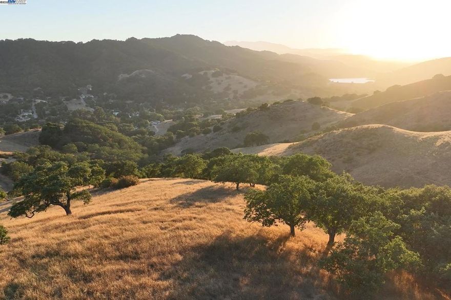 Incredible opportunity to own over 19 acres of scenic land in Morgan Hill, offering breathtaking 360-degree views of the city, rolling hills, and Chesbro Lake. Llagas Creek runs through the property, creating a rare creekside setting perfect for a custom estate, ranch, or private retreat. Spanning two parcels, this expansive lot offers multiple potential building sites, exceptional privacy, and stunning natural beauty. Enjoy open space, panoramic views, and peaceful surroundings. Located just minutes from downtown Morgan Hill, local wineries, and highway access. A one-of-a-kind chance to create something extraordinary in a highly sought-after South Bay location.