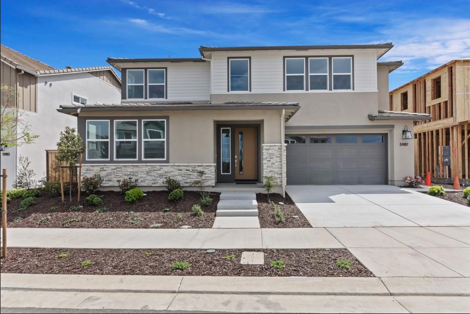 New construction | Homesite 363 | Plan 3. Welcome to Glisten at One Lake, resort living in your own neighborhood! This neighborhood of luxury homes is adjacent to Lake Trail Park and Lake Club with pool, kids splash pad, barbeque area and more. Come live large with plenty of space inside and outside your home for entertaining friends, enjoying recreational activities, and indulging quality quiet time. Because life is about balance, and it starts at home. This beautiful two-story home features 4 bedrooms and 3.5 baths, a generous primary suite with a spa-like bath perfect for relaxation, spacious upstairs loft and laundry room.