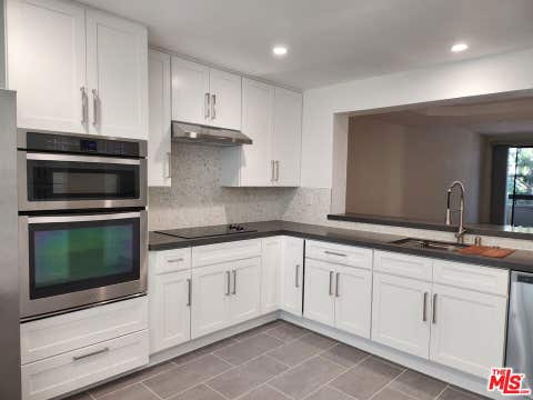 Photo of 2122 Century Park Lane #213, Los Angeles, CA 90067 (MLS # 26867973)