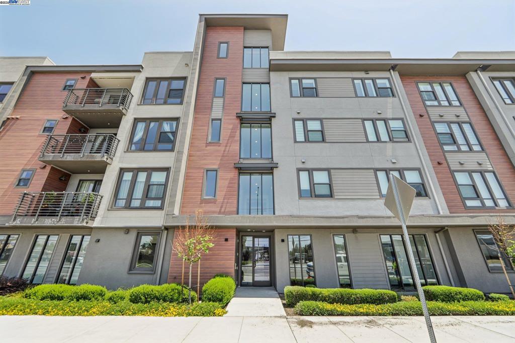 Experience California living in this beautifully designed single-story luxury condo. With an open layout and abundant natural light, this modern home features a chef’s kitchen with ceiling-height custom cabinetry, quartz island, and built-in stainless steel appliances. The spacious primary suite includes a large walk-in closet and a sleek bathroom with dual vanities and a glass-enclosed shower. Additional highlights include owned solar panels, a 2-car tandem garage with an EV charging outlet, and extra storage space. Located in the highly desirable Innovation community, residents enjoy access to a clubhouse, BBQ area, fitness center, and swimming pool. Conveniently close to parks, top schools, grocery stores, restaurants, and within walking distance to BART—this move-in-ready home blends comfort, efficiency, and location.