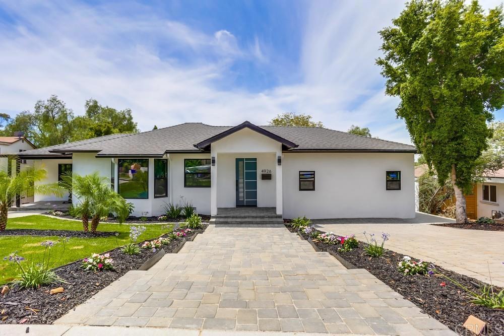 Welcome to this beautiful contemporary luxurious open floor plan home that sits on approximately .25 of an acre in the desirable College Area. The Main house consist of 3 bedroom, 3 full baths with spectacular landscaping, colorful plants a walkway full of concrete pavers stairs that leads into the entrance of the foyer and showcases rows of LED spotlights and luxury vinyl plank flooring throughout. Upon the entrance you will see and feel the open concept kitchen with a large sized kitchen Island countertop perfect for dining and entertaining, the ample floorplan allows an office area for working professionals and college students, enjoy the formal dining area alongside the dual pane sliding glass doors adjacent to the living room that receives an abundance of natural lighting and fresh ocean breeze air. For additional enjoyment you will step out into the handcrafted wood deck that displays breathtaking views and plenty of space to host friends and family. The deck offers access to the patio downstairs that leads to lush green grass and low maintenance patio area. To enjoy the full benefits and comfort of the dwelling the bedrooms and bathrooms are fully remodeled. The master bath offers a tub with dual sinks a stand-up shower with led lighting in the niche and modern fixtures. The hallway bath and 3rd bedroom bath offer the same posh led lighting in niche and upscale remodel. Furthermore, the property has an attached ADU two car garage conversation that was made into a 1 bedroom 1 bath with its own private entrance with all the same magnificent upgrades the main house offers with its own washer and dryer hooks ups and a full kitchen. The ADU is approximately 411 SQFT. Additionally, the property has an attached guest quarter downstairs that includes a 1 bedroom, 1 full bath with the same modernized touches the main house and ADU have. The Guest Quarter Square footage appears to be 454 SQFT. Next door to the Guest Quarters you will find a workshop that offer its own downstairs private entrance with endless opportunities to enjoy, the workshop offers its own full bath and countertops to enjoy an additional study area for the local SDSU Students. The workshop SQFT is approximately 222 SQFT. Come out and enjoy all the upscale renovation’s property has to offer. This Unique and desirable property offers much more than any other properties. You can live in 1 and rent the additional for streams of income and maximize your quality of life through the SDSU rental market.