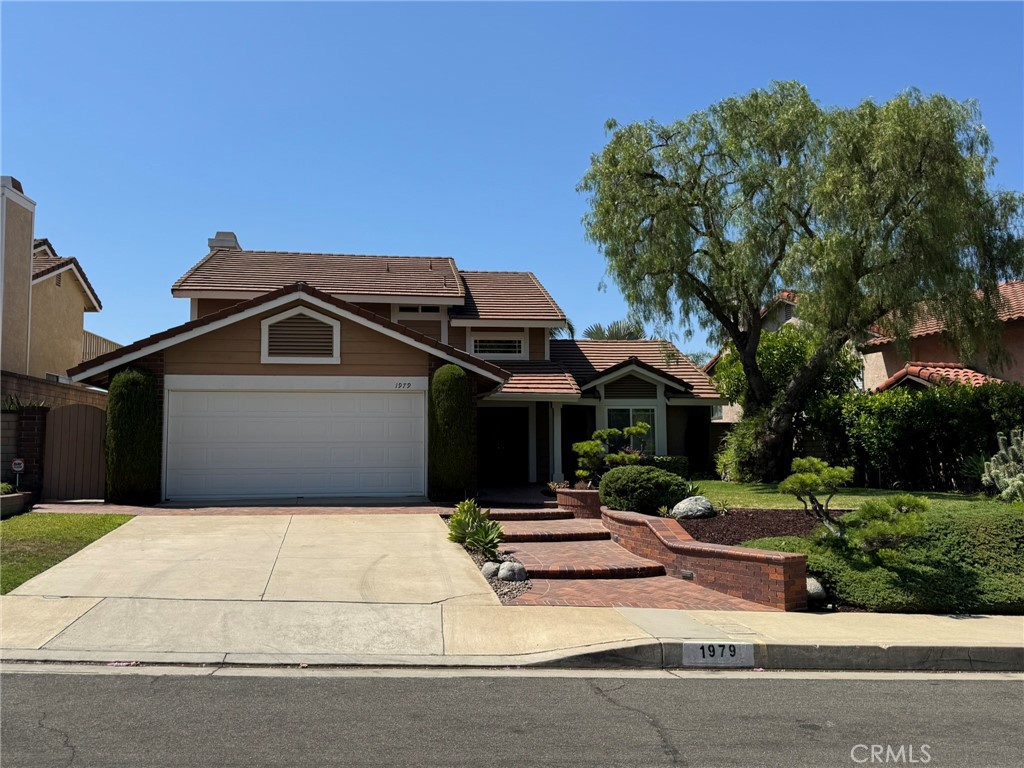 Spectacular view home with wonderful inviting salt water pool with covered patio and built in BBQ grill. This home is located in the desirable Walnut School District and walking distance to Starshine Park. New interior paint, new A/C unit, marble floors in the entry, dining room and family room. Updated kitchen with granite countertops and island, perfect for the home chef. The family room has a cozy fireplace and a sliding door that leads to the relaxing backyard. The downstairs has a bedroom with bathroom. The upstairs has 2 bedrooms and a master bedroom with a balcony and view. The master bathroom has been updated with a walk-in closet. Gardener and pool service included. Sorry, no pets or smokers.