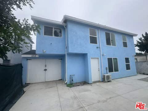 Photo of 1012 E 73rd Street, Los Angeles, CA 90001 (MLS # 26837075)