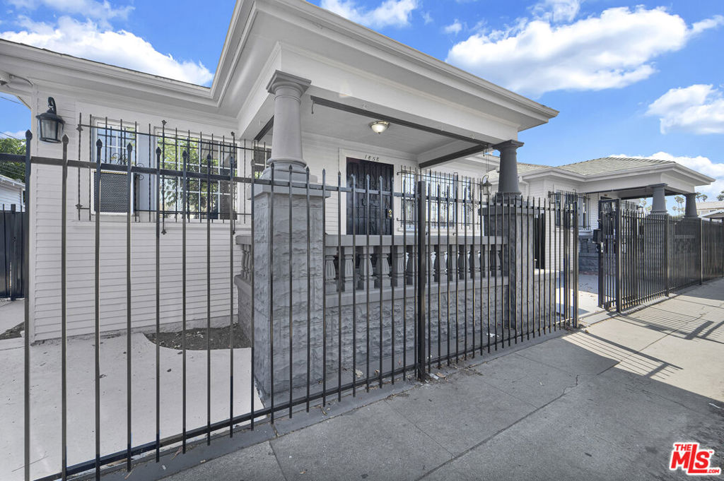 Pride of ownership is evident in this well-maintained Duplex offering versatility for both owner-users and investors. Featuring two detached 2-bedroom, 1-bath units, both fully vacant and move-in ready, with washer/dryer hookups for added convenience. The wide lot provides a spacious front yard ideal for gatherings, flexible use, or potential expansion. Recent upgrades highlight the care invested throughout: fresh interior and exterior paint, sleek metal trim accents on the house and garage, refinished hardwood and tile floors, custom window blinds with UV tint, ceiling fans, modern lighting, and window A/C units. Bathrooms have been refreshed with newly glazed tubs and updated enclosures. Additional improvements include security lighting and cameras, reinforced bar doors and windows, roof vent replacements, gutter repairs, and full extermination tenting completed in 2024. The landscaped grounds feature fruit trees, benches, hardscape, a water fountain, and a bonus shedall secured by a gated wrought-iron fence.This turnkey property is an excellent opportunity for an owner-user seeking supplemental rental income or an investor looking for a ready-to-go asset with strong upside potential.