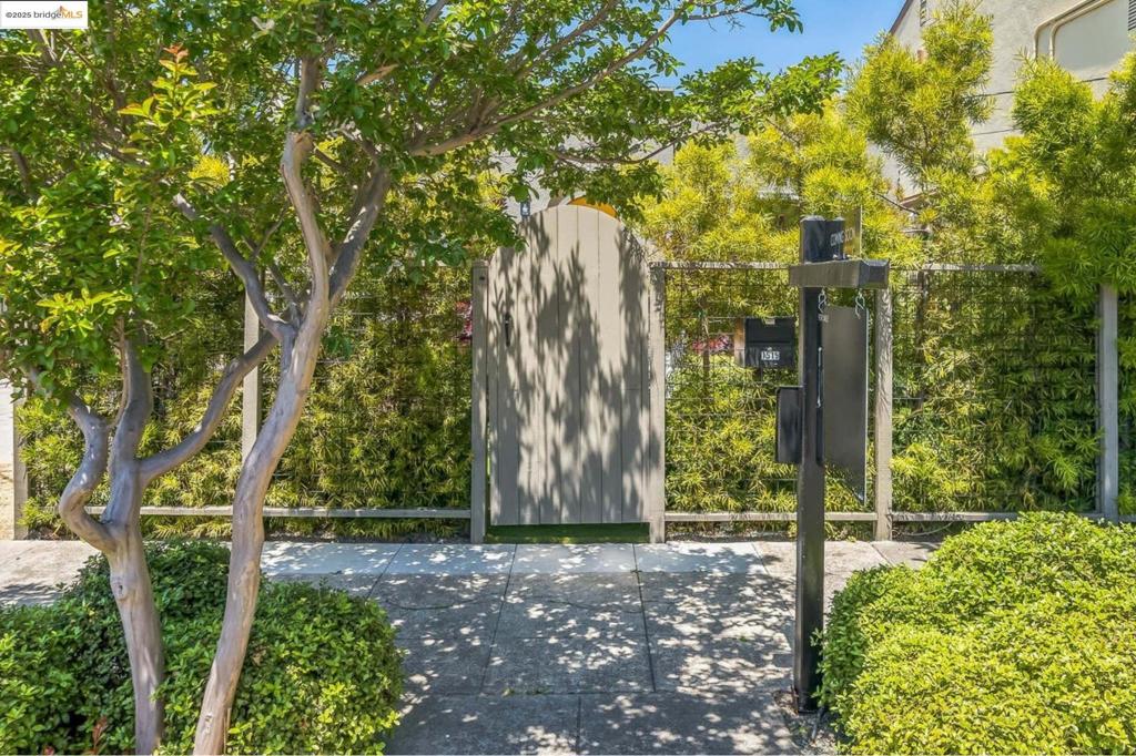 Welcome to this beautifully renovated 2-bedroom, 1-bathroom condo (TIC) that offers the privacy and feel of a single family home. Tucked behind lush landscaping, this bright and stylish residence features an updated kitchen and bathroom with brand-new appliances, modern finishes, and thoughtful upgrades throughout. Step outside to your own private patio oasis with newly installed turf—perfect for relaxing, entertaining, or easy-care gardening. The low-maintenance yard is surrounded by a beautiful garden that adds charm and tranquility to your outdoor living space. Enjoy the best of urban convenience with popular restaurants and coffee shops just blocks away, and effortless commuting with Ashby BART station only 4 minutes away and UC Berkeley just a 6-minute drive. Don't miss this rare opportunity to own a turnkey home in a vibrant and sought-after neighborhood!