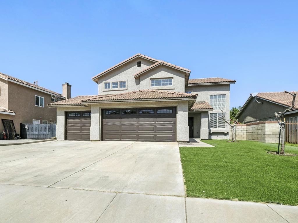 With seven bedrooms, a beautiful backyard filled with fruit trees, and a peaceful cul-de-sac location, this Lancaster home offers the space and setting to truly settle in. Large windows draw natural light into the open-concept common areas, where vaulted ceilings and warm finishes create an inviting atmosphere. In the kitchen, stainless steel appliances, generous counter space, and an abundance of cabinetry help make daily routines feel seamless. Just beyond the sliding glass doors, a covered patio leads to a lush backyard with plenty of fruit trees and room to relax or garden. Your main bedroom stands out with its soothing green walls, dual-aspect windows, and a charming brick fireplace. Theres ample space for a full bedroom suite, and the layout easily accommodates both rest and organization. Two pets are welcome, and the home's layout easily accommodates varied lifestyles. An attached 3-car garage with an automatic door offers plenty of secure parking and storage. Located in a serene neighborhood not far from groceries, parks, and the amenities of central Lancaster, this home brings everyday convenience and calm living together in one thoughtful package. *Fireplace is for decorative use only and cannot be used without consent from Belong.
