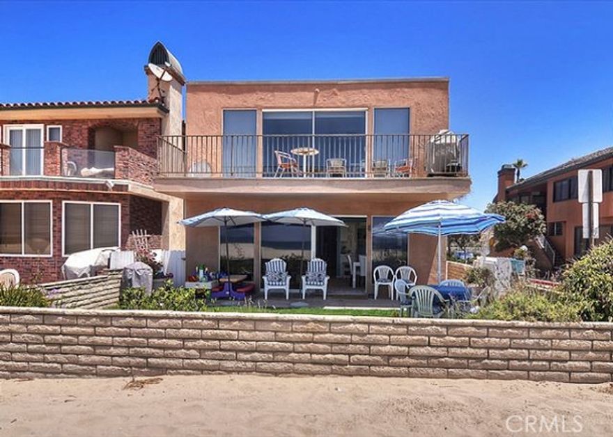 ORIGINAL LIST PRICE $10,900,000, NOW... $9,900,000.ONE OF ONLY 2 OF THE FINEST OCEAN FRONT CORNERS IN WEST NEWPORT, PROVIDES ALL DAY SUN FROM THE LARGEST LOT ON QUIET, UNCROWDED WHITE SAND NON-BOARDWALK BEACH, WITH NO HOUSES IN BACK AND SPECTACULAR PANORAMIC OCEAN/COASTLINE VIEWS FROM THE NEWPORT PIER TO PT. FERMIN IN FRONT.  IMPROVED WITH 2 OCEAN FRONT MID-CENTURY NATURAL LIGHT FILLED CONTEMPORARY UNITS (CAN'T BE DUPLICATED). UPPER: 3 BEDROOMS, 1-3/4 BATHS, FAMILY ROOM, LARGE DECK, BREATHTAKING VIEWS; KITCHEN, BATH REMODELS NOT COMPLETED.  LOWER: 3 BEDROOMS, 1-3/4 BATHS FRONT PATIO/YARD, OCEAN VIEWS. 3 CAR GARAGE (CAN'T BE DUPLICATED), AND 3/4 BEACH BATH.  POTENTIAL: COMPLETE UPPER UNIT KITCHEN, BATH RENOVATIONS, ENJOY AS IS. RENOVATE FOR USE AS A DUPLEX OR A SINGLE-FAMILY RESIDENCE WITH ADU. CREATE A WORLD-CLASS HOME WITH ADU ON THE "FRONT ROW" WITH EASY ACCESS TO ALL THE WONDERFUL EXPERIENCES THAT NEWPORT BEACH HAS TO OFFER.