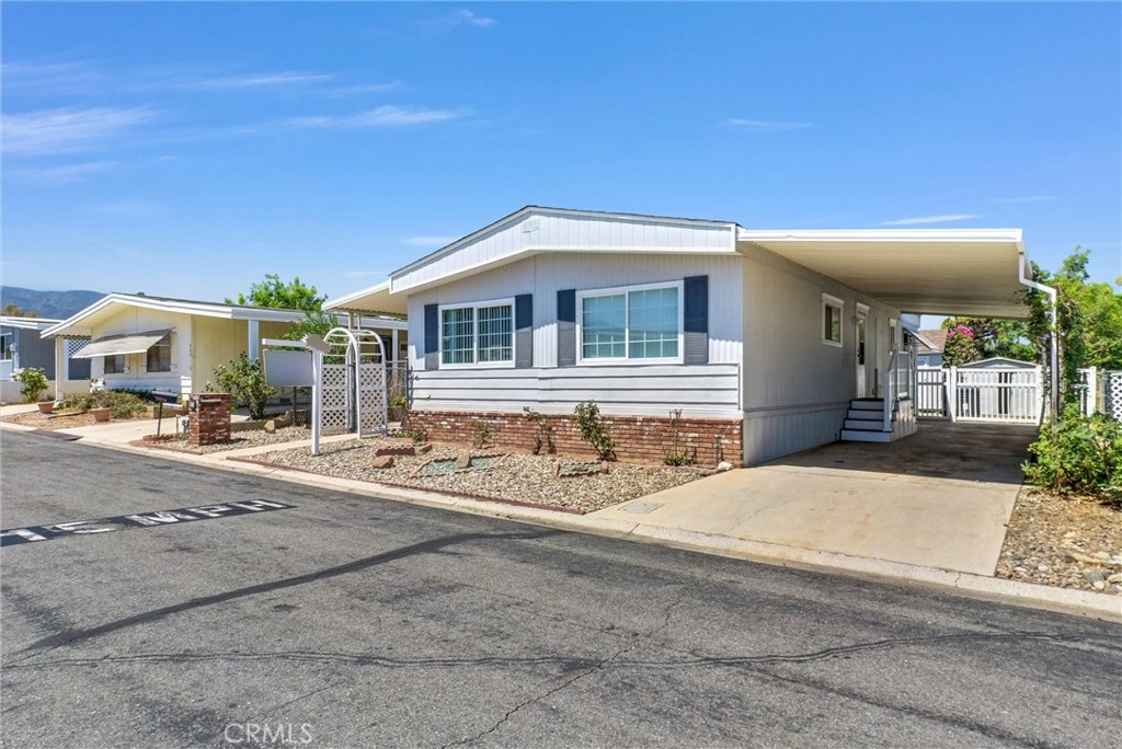 Discover the perfect blend of comfort and convenience in this spacious 2-bedroom, 2-bath home located in a well-maintained 55 and older community where you own the land ~ no space rent!
Enjoy newly installed carpet and luxury vinyl flooring, a bright and functional kitchen, a comfortable living room, and a versatile bonus room ideal for a home office, hobby space, or guest area. With two separate entrances, you’ll appreciate the added flexibility and privacy.
Outside, you’ll find covered parking right next to the home, a large storage shed, and access to excellent community features including a clubhouse, pool and spa, and a greenbelt walking path perfect for enjoying time outdoors ~ with or without your pets.
Conveniently located near shopping, dining, and major freeways, this home offers an easy lifestyle in a vibrant 55 and older community where residents take pride in their homes and surroundings.
