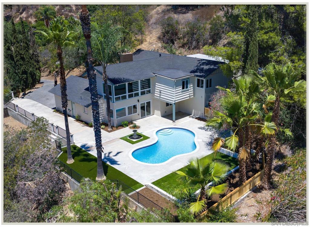 WANT TO AVOID THE HUSTLE AND BUSTLE OF A CROWDED CITY LIFE? THIS IS TRULY A PRIVACY GEM, FULLY REMODELED AND LIKE NEW. PANORAMIC VIEWS TO ENJOY FROM EITHER YOUR LIVING ROOM, KITCHEN/BREAKFAST AREA, OR BEDROOM. THE PROPERTY SITS ON OVER AN ACRE AND ATOP GEM HILL LN, SURROUNDED IN PRIVACY AND TREES! WIND YOUR WAY UP THIS SEMI-RURAL NEIGHBORHOOD ROADWAY, WITH NO STREET LIGHTS TO BLOCK YOUR VIEW OF THE STARS, BUT BE WITHIN 35 MINUTES OF MOST ANYWHERE YOU NEED TO GO IN SAN DIEGO--FROM LA JOLLA SHORES, TO DOWNTOWN SAN DIEGO, AND LINDBERGH INTERNATIONAL AIRPORT. FISHING AND BOATING JUST MINUTES AWAY AND MILES OF HIKING TRAILS A FEW BLOCKS NORTH (SEE MAP IN PHOTO GALLERY.). NEWLY REFINISHED POOL FOR ENTERTAINING. TWO FIREPLACES, CENTRAL AIR, ALL NEW APPLIANCES, A HOST OF NEWLY BUILT IMPROVEMENTS AND EXTRAS (SEE SUPPLEMENT BELOW). 4TH BEDROOM ORIGINALLY A DEN, NOW CONVERTED WITH NEW CLOSET, WITH EXTRA 1/2 BATH ADDED BY PREVIOUS OWNER. VIRTUAL STAGING USED WITH PHOTOS. SELLER TO CONSIDER OFFERS BETWEEN $950,000-$1,050,000. New 200 amp electrical service 50 amp plug in the garage for electric cars All the wiring has been replaced, outlets, switches etc upgraded with ground wires. Can lighting throughout All new appliances pool equipment refreshed, new filter mesh New pool plaster, tile and coping New skimmer Automatic pool filler New roof Fresh paint inside and out All new hard flooring, same throughout Master bathroom Double sinks New tub in full bath All New tile in master Glass door from master bedroom to patio All new lighting fixtures Deck for jacuzzi Two fireplaces Open beam ceiling is insulated All new cabinetry, wood grain Air conditioning fully serviced Ducting re insulated New drain line to septic All new plumbing Dual pane windows with bevel glass on the inside for easy cleaning New garage door opener New ceiling fans with remotes 100 ft rv / trailer parking New shaded private patio. Slab for jacuzzi. Charge plug for electric car. Epoxy garage floor