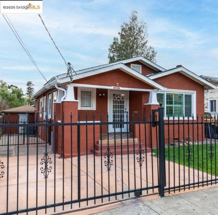Welcome to 8039 Idlewood Street, a charming single story home located in Oakland’s Eastmont neighborhood. Built in 1925, this home showcases classic character with a welcoming front porch, hardwood floors and a cozy fireplace. Upgrades include new dual-pane windows, solar system, smart features, a new HVAC heating and cooling system and a new water heater.  The exterior features a long driveway with ample parking, a converted garage serving a variety of needs, and a versatile storage unit in the backyard—ideal for tools, hobbies, or additional storage needs. With convenient access to the 580 freeway and nearby shopping, this home combines comfort with accessibility. Bring your vision and make this house your home!