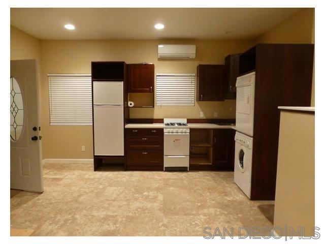 Welcome home to your new studio apartment behind private residence in Allied Gardens. Newer construction. This centrally located home features indoor laundry, tile flooring, recessed lighting, off street parking, a large patio and A/C. Located in a quiet neighborhood, so much more private than an apartment complex. Washer/dryer in unit, utilities included! Only five minutes to the 8 & 15 freeways. Close to SDSU and public transportation.