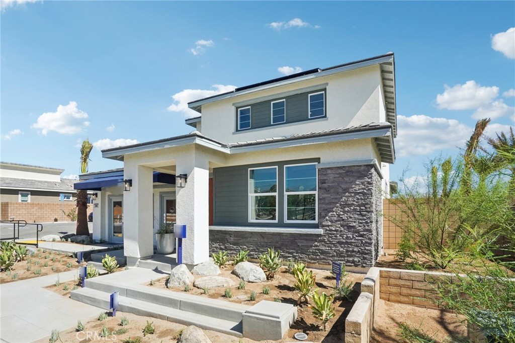 NEW CONSTRUCTION - SINGLE-FAMILY HOMES – NEW COMMUNITY! - Welcome to The Collection at Sage, a beautiful, gated, detached home community located in the city of Palm Desert. Featuring one and two-story homes ranging from to 1,750 sq. ft. to 2,312 sq. ft., with up to 4 bedrooms and 3 bathrooms, The Collection at Sage offers desert lifestyle living at its best with a sparkling community pool, clubhouse, fitness center and more! This Residence 2312 is the highlight of the collection, offering a spacious 2-story plan with the PRIMARY BEDROOM AND BATH AND ADDITIONAL BEDROOMS 2 AND 3 AND FULL BATH – ALL ON THE MAIN FLOOR. This light and airy, open concept design wows with a long entry that leads to two bedrooms and a bath at the front of the home and then opens to the gracious Great Room, Kitchen and Dining space perfect for entertaining friends and family. The gourmet Kitchen features stainless-steel appliances including cooktop/oven, dishwasher, and microwave, quartz kitchen counter tops and large island, right-sized for meal prep or for extra dining and seating. Upstairs, the large Loft space sets the stage for perfect movie nights, game days, studying or just lounging. The large and spacious additional bedroom and full bathroom are a plus and is perfect for someone needing a more private, second-floor space. The Primary Bedroom and Bath leave nothing to be desired, offering an expansive space to unwind and the large Bathroom offers a beautiful walk-in shower and walk-in closet to be envied! Among the features and finishes, homeowners will appreciate the unparalleled peace of mind in owning America’s Smart Home, Home is Connected, which provides smart home features, all conveniently controlled through one application to stay connected to home around the clock.