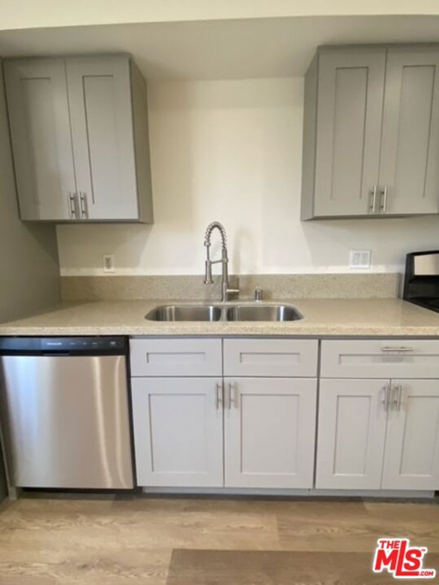Experience modern living in this beautifully remodeled one-bedroom, one-bath residence, located in the heart of San Fernando. This stylish unit offers an open and bright floor plan, with abundant natural light and designer finishes throughout. Featuring luxury vinyl plank flooring, recessed lighting, and neutral modern tones, the space flows seamlessly from the living area to the updated kitchen  complete with stainless steel appliances, ample cabinetry, and a convenient pantry for extra storage. The spacious bedroom offers comfort and privacy, while the updated bath features elegant fixtures and contemporary design. Enjoy the easy move-in process, modern finishes, and convenient location close to local shops, parks, freeways, and restaurants. Please call Elaine Quizon for more information or showings.