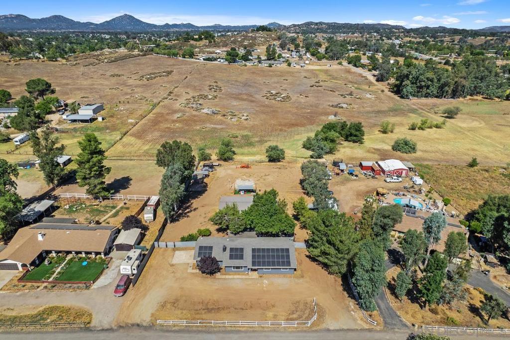 Ideal country living just minutes from town! This charming ranch-style home offers the best of both worlds: equestrian and rural opportunities with the convenience and access to local shops, dining, and schools within walking distance (1 mile). Situated on a large, usable lot with A70 Limited Agricultural Zoning, this zoning generally allows for non-commercial horse boarding, crop production, small farm animals, and even onsite agricultural product processing — making it perfect for hobby farmers, horse lovers, or anyone seeking a self-sufficient lifestyle.