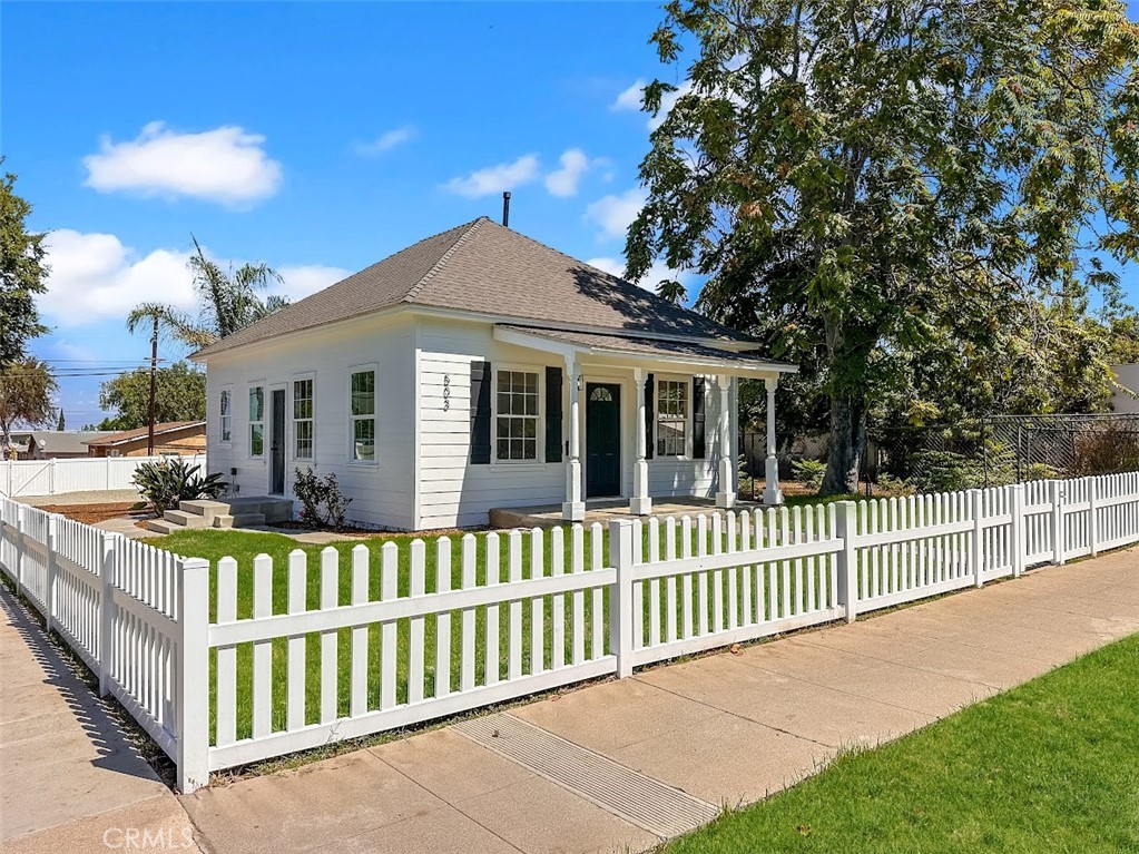 Beautifully updated single-story 2BD/1BA home on a highly desirable R3-zoned corner lot in the heart of Corona’s Circle City! Too many recent upgrades to fully list but include NEW LVT flooring throughout, soft close shaker kitchen cabinets, quartz counters, interior/exterior paint and stainless steel appliances. Enjoy all the ambiance in your great room set up with recently renovated kitchen, dining area and living room, perfect for both entertaining and every day living. Thoughtful upgrades include ceiling fans, recessed lighting, generous storage, a breakfast bar, and a new energy-efficient split HVAC system for year-round comfort. Master bedroom with direct entry into hallway bathroom. Huge backyard with new landscaping and so much blank canvas potential for RV parking, separate ADU unit and plenty of space to play and make your own. This home has gorgeous curb appeal and is conveniently close to downtown Corona and area restaurants, schools, parks, recreation, shopping and so much more! Perfect as your next home, income property or redevelopment opportunity.
