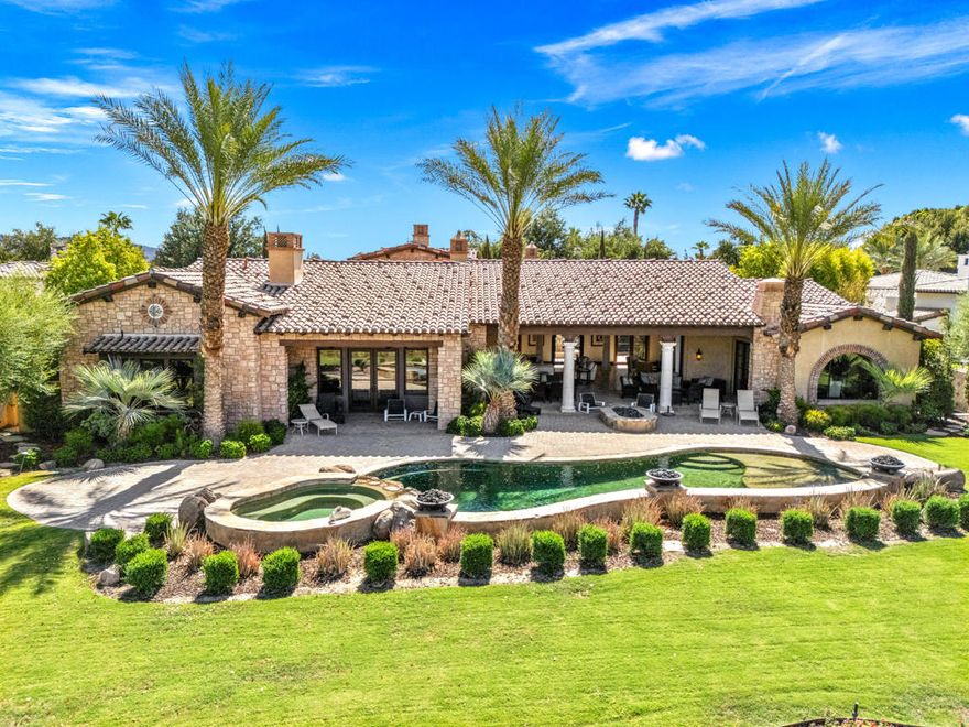 Stunning custom home at the newly renovated Hideaway Golf Club in La Quinta! Location, location, location! Five Bedrooms (5th bedroom is currently a home theater), five bathrooms plus powder room including one bedroom casita with living room with fireplace. Approx. 6,395 sq. ft. on an approx. 1/2 acre lot. Enter through courtyard with custom fountain. Great room with oversized custom fireplace, and gourmet kitchen with  center island / bar and wine cellar/tasting room and lovely dining area. Oversized bedroom suite with it's own patio featuring a fireplace overlooking the courtyard. Luxurious primary suite with fireplace, complete this stately home. Top quality throughout, with all the right amenities. Pocket doors lead to grand loggia with BBQ kitchen, fire pit, custom pool with raised spa and bowls of fire for dramatic entertaining! Attention to every detail with the most desirable materials used throughout. Amazing panoramic west lake & mountain views on the17th fairway of the Clive Clark course! (New photos to come following re-seeding of golf courses).