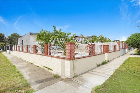 Photo of 9027 Menlo Ave, Los Angeles, CA 90044 (MLS # DW26072482)