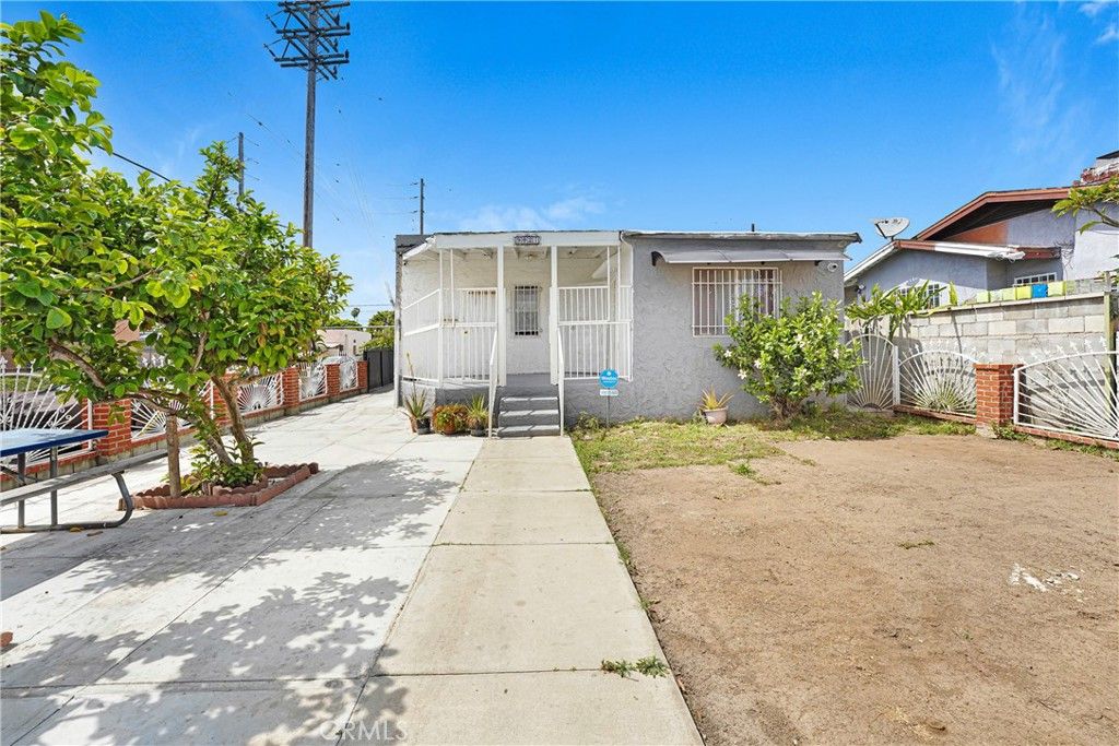 Photo of 9027 Menlo Ave, Los Angeles, CA 90044 (MLS # DW26072482)