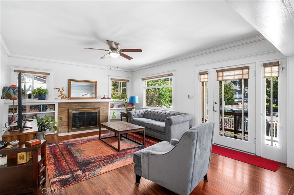 Introducing 6508 Repton in the Historic Garvanza Enclave of Highland Park just steps from Garvanza Park and York blvds Creative Energy. This 1922 character-rich home features a classic facade with original restored front windows. The front door opens to reveal hardwood floors, a sunbathed living space that illuminates every corner, a fireplace framed with custom book shelves, and a vibrant open layout. The dining room features restored built in cabinetry, original crown molding, and a work station that peaks out to a spacious front yard. Two bedrooms offer a quiet retreat from the world, the refreshed bathroom design becomes a space for reflection and pause from the daily rhythm. The kitchen offers more utility with additional seating and convenient wash station. This is not just a house; it is a place to root down and blossom. It's where creativity collides with history and the serenity of a private retreat. 1st showings will be 8/9 and 8/10 from 1-3pm.