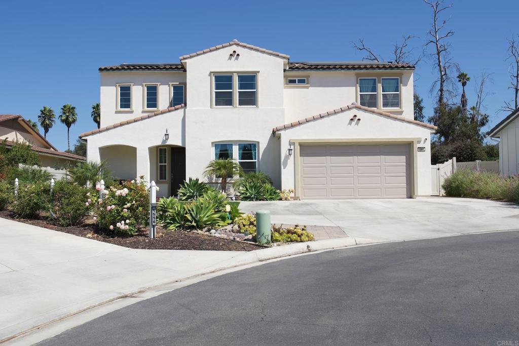 A picturesque California modern mission-style residence is situated within the renowned and charming gated Oak Creek community of twenty-four spacious homes without Mello-Roos. Vista, a community nestled within San Diego County, stands as a rare gem, offering residents a unique blend of urban and rural charm and an unspoiled natural environment. This charming residence is nestled amidst scenic hills and lush greenery where the community offers a harmonious blend of tranquility and modern living. It is an ideal choice for families, retirees, and individuals seeking respite from the urban lifestyle. This meticulously designed residence shows custom finishes seamlessly integrated throughout the 5 bedrooms and 4 bathrooms, which includes a first floor en-suite and second floor owner’s en-suite. The residence boasts well-maintained interiors, tasteful contemporary upgrades along with meticulous touches featuring a gourmet chef kitchen, huge island, walk-in pantry, dining space, and laundry room with sink. Generously equipped with solar and EV hookup. Plenty of natural lighting, open floor plan, security system, and storage. Owner suite includes a beautiful en-suite with separate vanities and closets as well as a bathtub over looking the greenery of Vista’s natural preserve. The property offers breathtaking northern views of the greenbelt foothills, stretching from the hilltop to Buena Creek. The expansive property offers ample outdoor entertainment, including the availability of a heated saltwater pool, spa, modest waterfall, and outdoor kitchen bar. A fully fenced entertaining property features exceptionally manicured landscape, fruit trees, covered patio, natural gas fire pit lounging area, and an entertaining outdoor kitchen offering, mini-fridge, bar sink, ice maker, grill and plenty of counter space. A tranquil oasis coupled with a flat level yard making this home fit for the most discerning occupant. This home is set to please most outdoor enthusiasts situated as a gateway to numerous hiking trails and nature reserves, perfect for exploring the stunning north county San Diego countryside. This home is conveniently located in close proximity to a major highway allows for easy access to downtown Vista, golf courses, nearby parks, recreational facilities, a variety of shopping and dining options, and the beautiful beaches of the southern west coast.